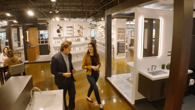 Design consultant helping customer in Banner Plumbing kitchen and bath showroom